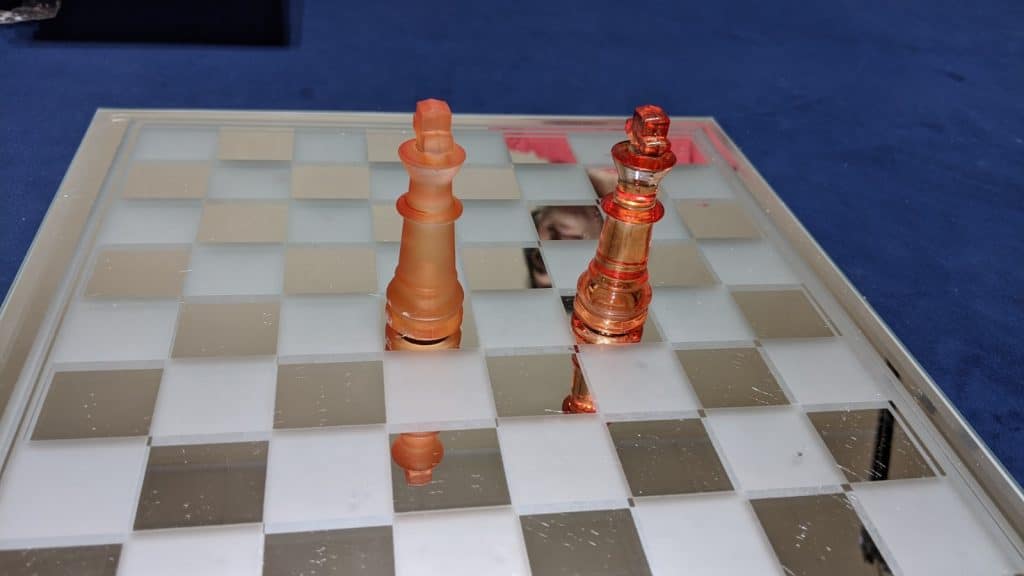 two kings on glass chess board