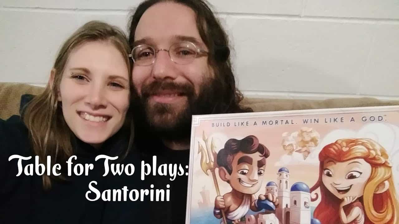 gaming couple playing santorini