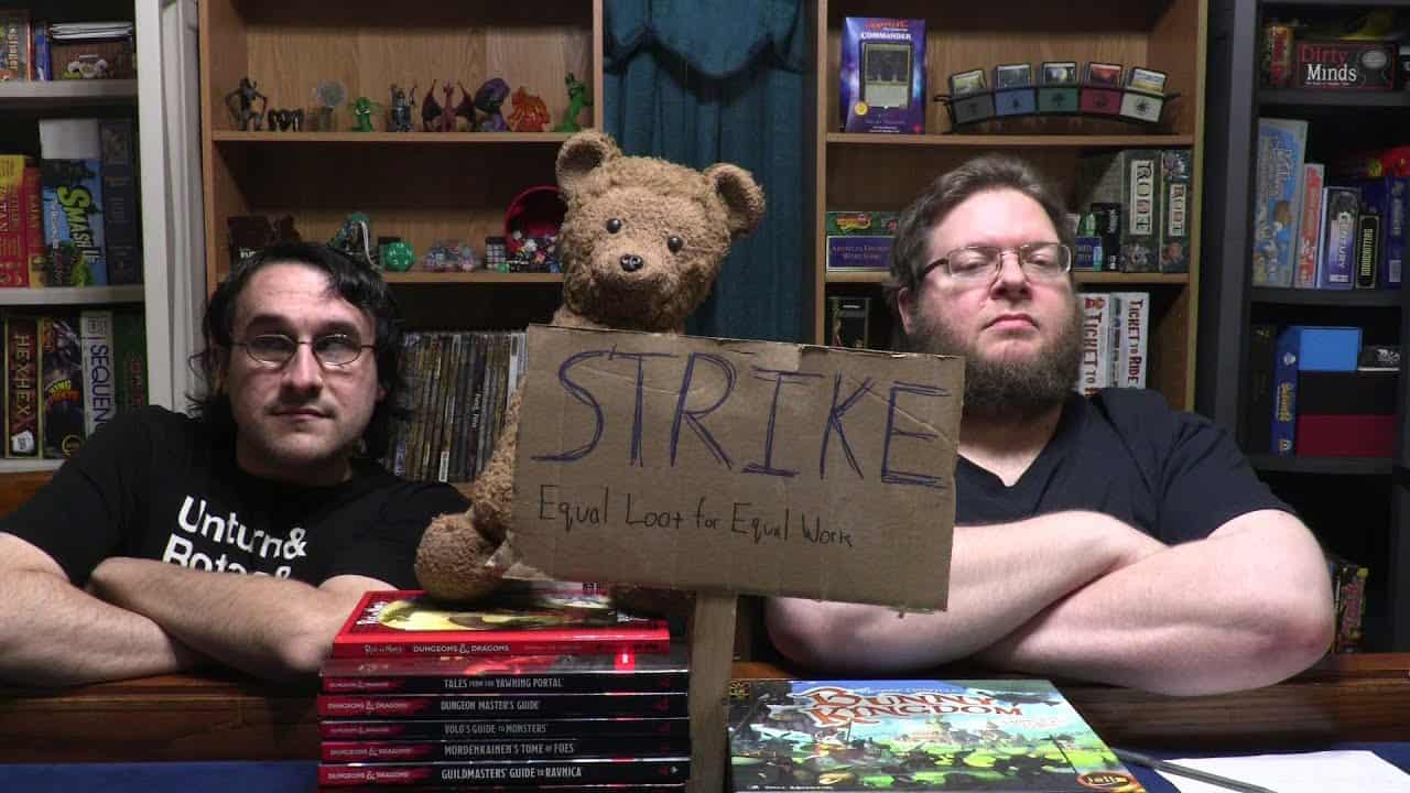 two gamers and teddy bear on strike