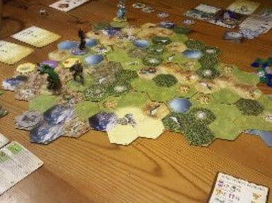 Mage Knight boardgame on wood table