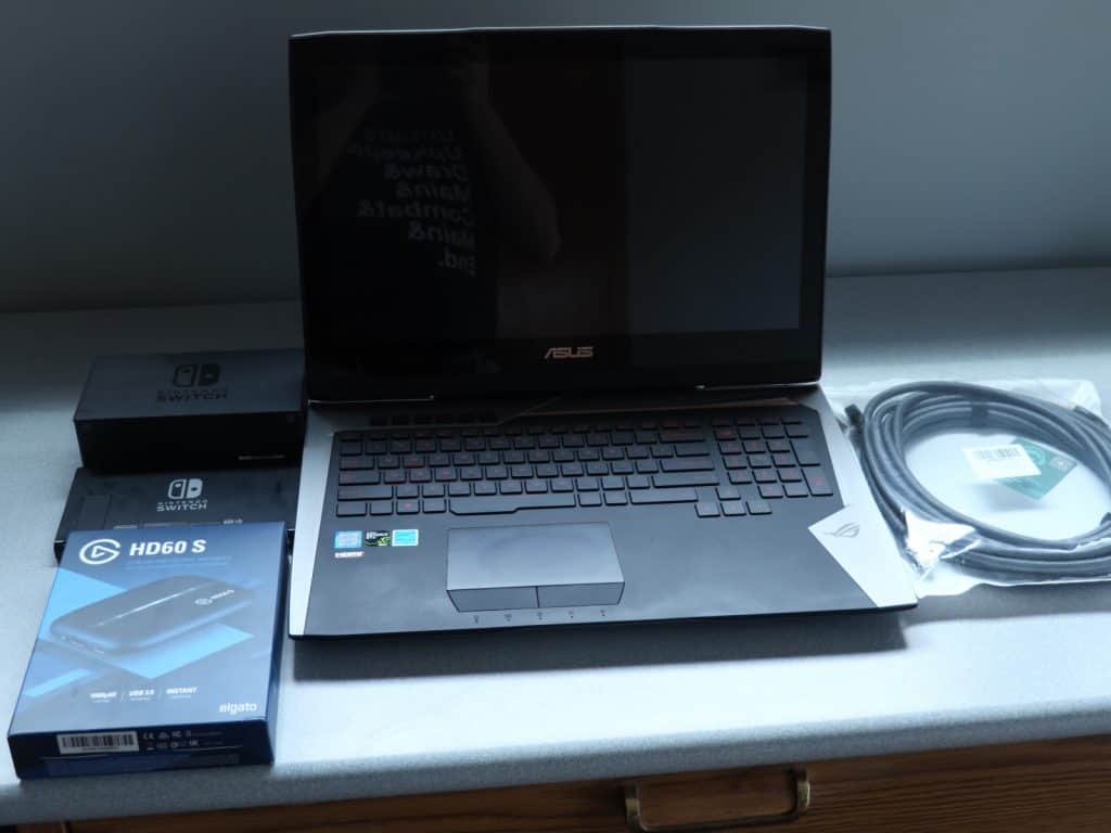 Laptop, capture card, Nintendo Switch, HDMI cables