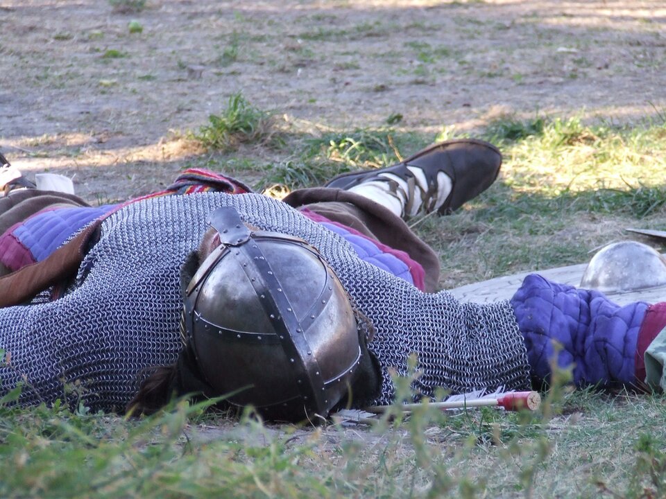 passed out or killed medieval warrior