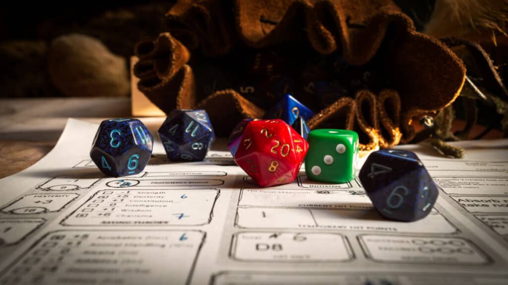 various polyhedral dice on dnd character sheet