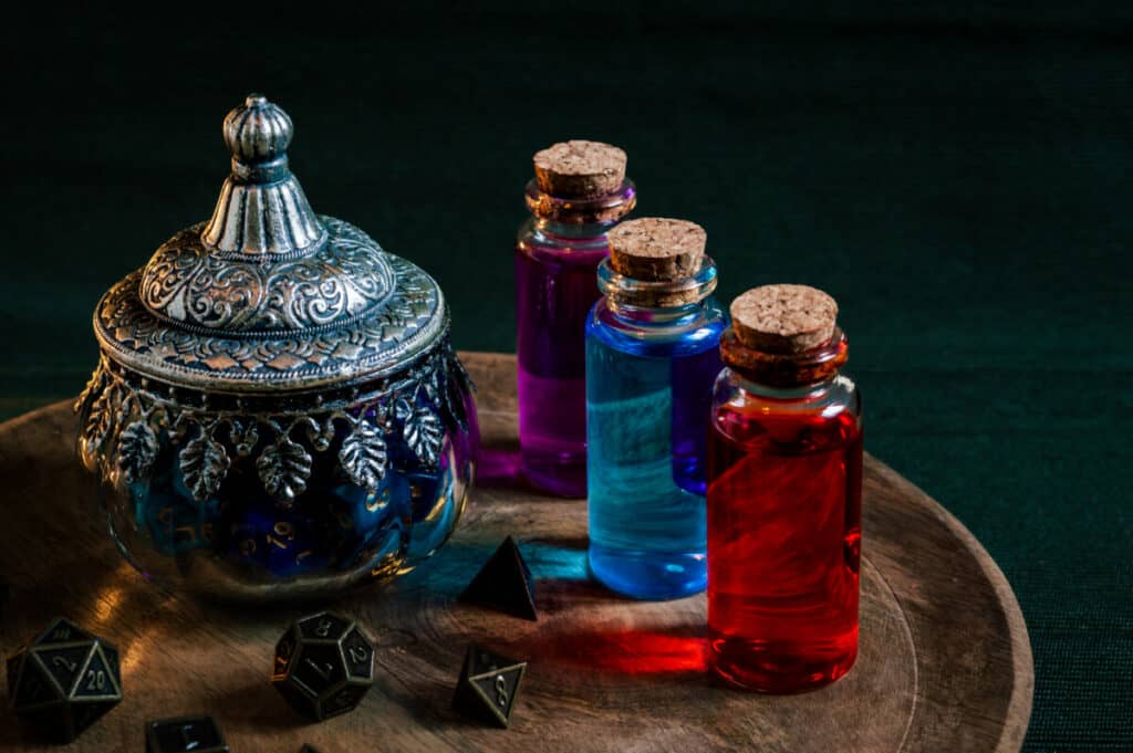 colored liquids on wood plate with dice