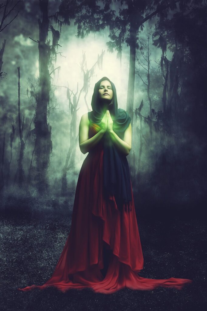 woman cultist praying in forest at night